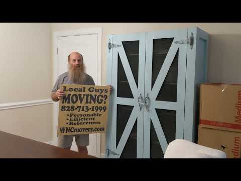 asheville-local-movers-unloading-pods-at-the-groves-at-town-center-apartments-in-fletcher-nc