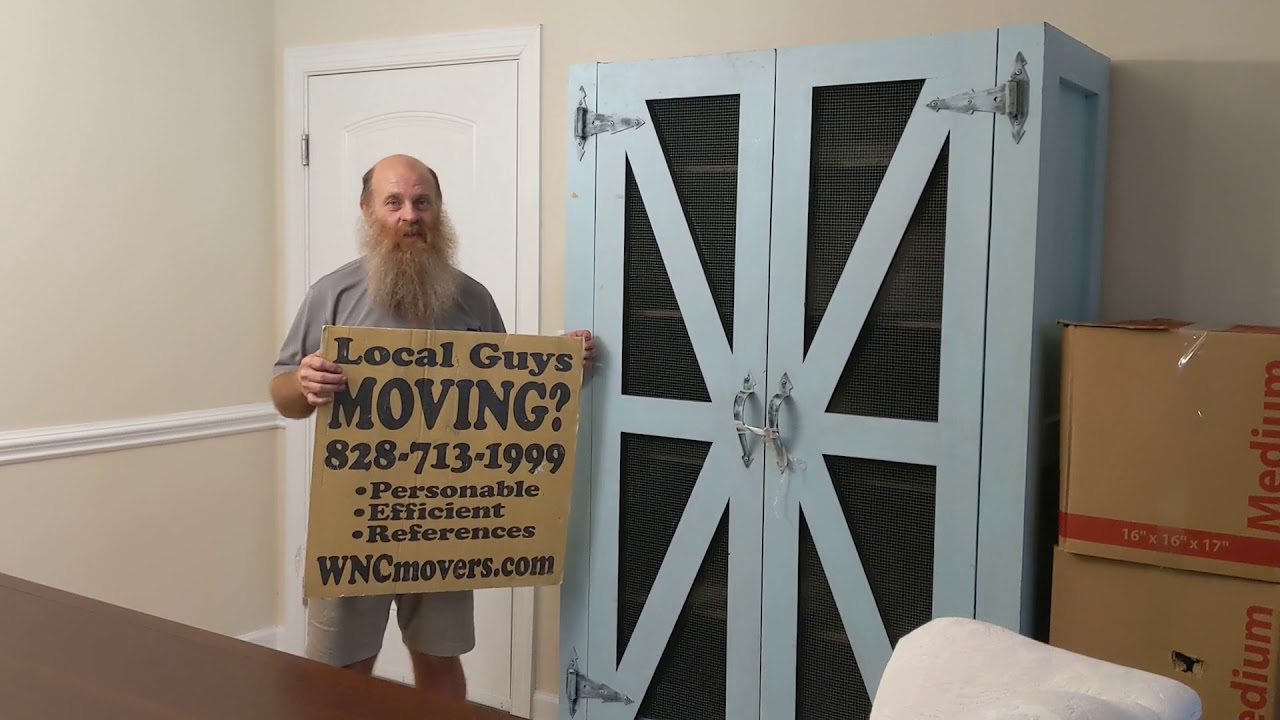 Asheville Local Movers Unloading PODS at The Groves at Town Center