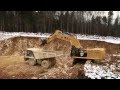 Cat® 390F Excavator at Work Digging and Loading