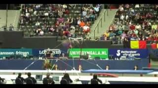 Uneven bars. Stalder and Tcachev piked (Downie) (F)