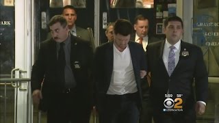 Murder Suspect Led From Precinct