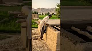 8Farmer adjusting roof parts