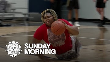 8th grader without legs makes basketball team