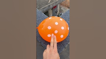 Experiment: Will a water balloon explode if it rolls down a tall building? 💥🎈 #balloon