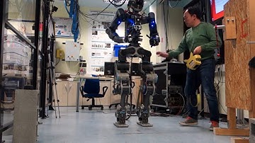 Humanoid robot WalkMan reactive stepping during standing