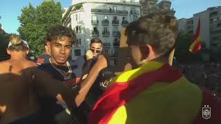 Lamine Yamal reacts to 'Gavi vs Paredes' poster at Spain parade