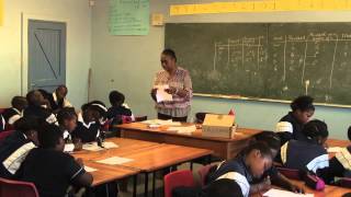 Giving answers and class making corrections