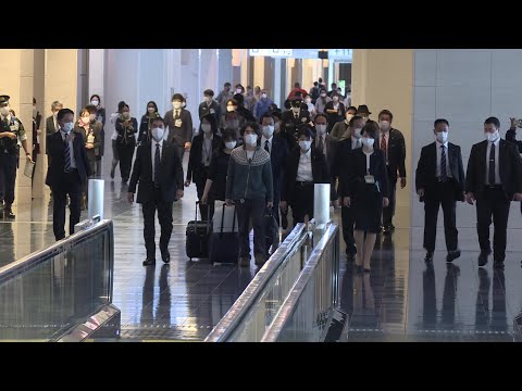 Japan's former princess Mako boards flight to New York with husband | AFP