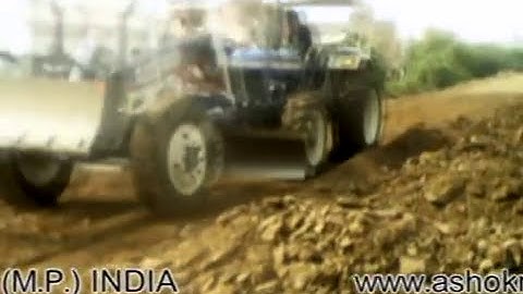 Tractor Grader working Over FT 6065 Tractor