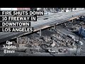 Fire under 10 Freeway in downtown L.A. upends traffic with no reopening in sight