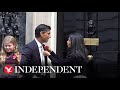 Rishi Sunak buys poppies with wife Akshata Murty outside No 10