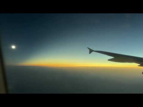 Total Solar Eclipse From the Sky - Airplane Window View on Commercial Flight - Spain 2026