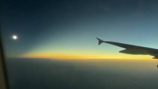 Total Solar Eclipse From the Sky - Airplane Window View on Commercial Flight - Spain 2026