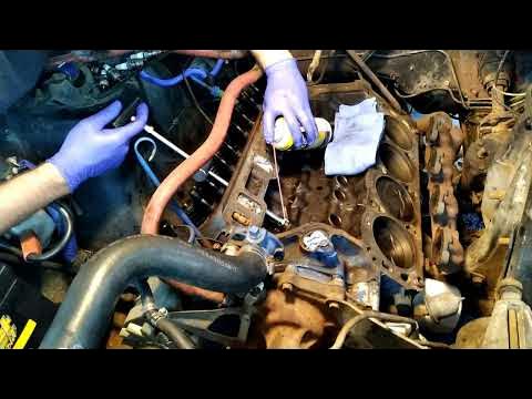 How to remove lifters with the head still on the engine - YouTube