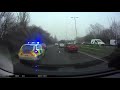 Police chase car going wrong way on roundabout before it bursts into flames after collision