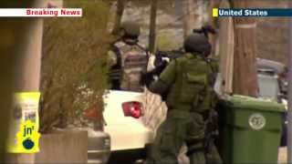 Boston manhunt: police go door-to-door to track down bombing suspect Dzhokhar Tsaranaev