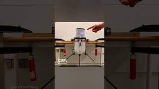 This drone has two small motors that spin in opposite directions to lift
