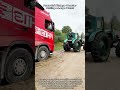 Powerful Vintage Tractor Pulling a Large Truck