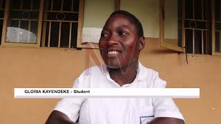 Gloria Kayendeke uses mouth to write her S4 final examinations - Vimarsana News