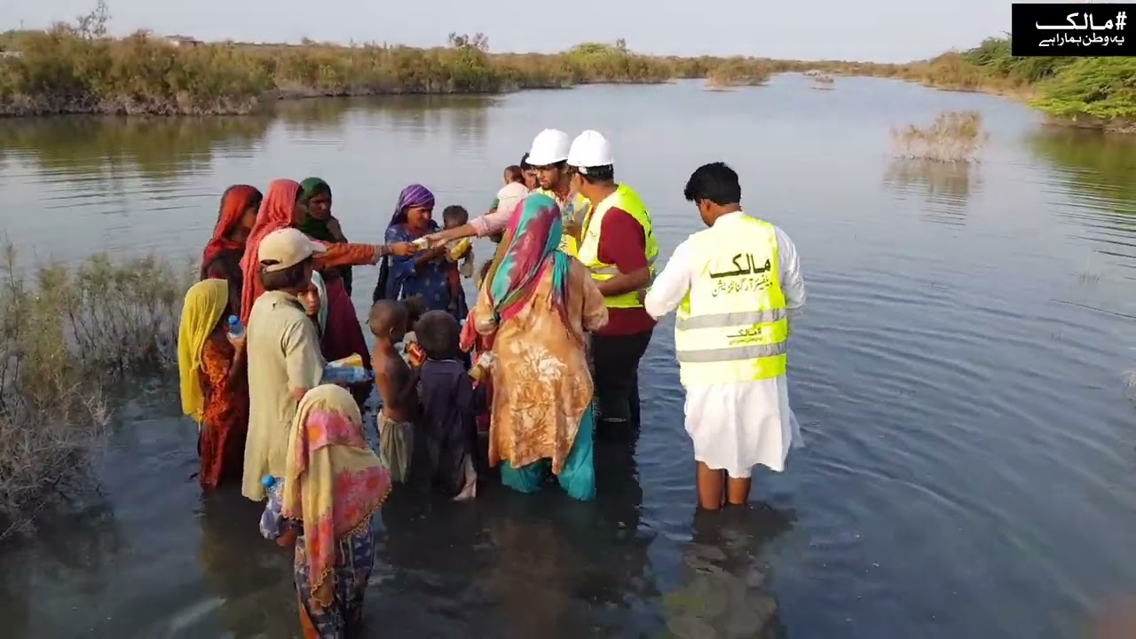 water biscuits milk etc distribution for flood victims