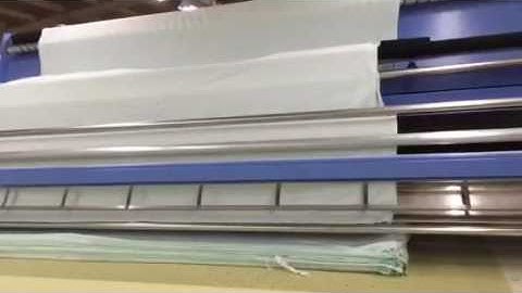 Winda auto spreader for knit fabric