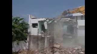 Tritherm-Building demolition-Jaw crusher/pulveriser in chennai,india-By Exacavator poclain m/c