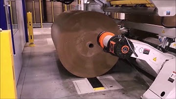 Auto roll load to unwind stand via segmented belt