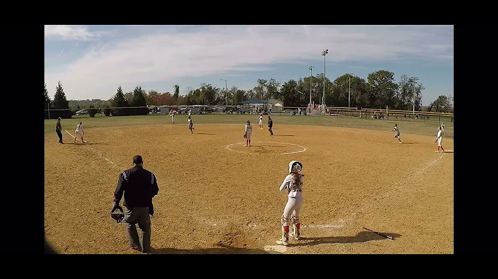 Julie West throws out runner at 3rd from left