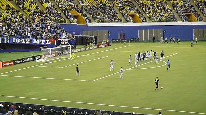 Kamal Miller of CF Montreal is stopped by Santos Laguna's Carlos Acevedo CONCACAF Champions League