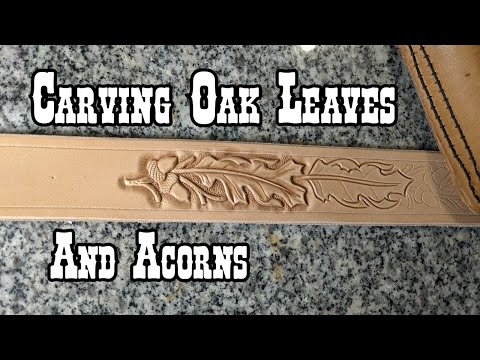 Carving oak leaves and acorns in to a leather belt