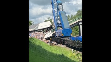 SCENE: Seven killed after bridge collapse near rail line in Russia