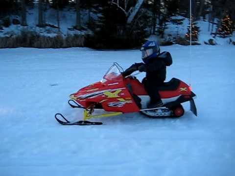 Jayden Riding his Polaris 120 Snowmobile at 2 year...