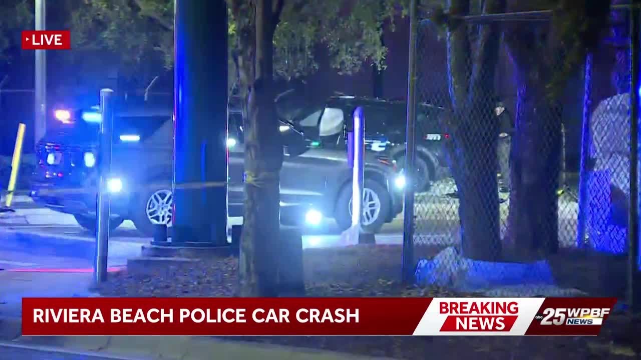 Riviera Beach police officer hospitalized after crashing into tree