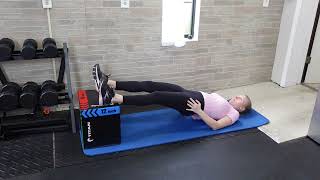 Feet elevated straight leg bridge