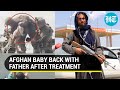 'Afghan baby lifted over wall at Kabul airport reunited with father': US Marines