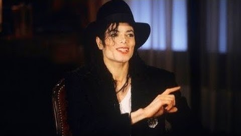 Michael Jackson signing an autograph (Interview with Barbara Walters, 1997) (Rmst. Quality) 50fps