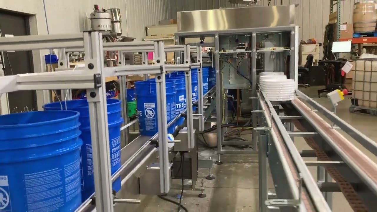 Apex Filling Systems- 6 Head 5 Gallon Pail Filler and Automatic Lidder