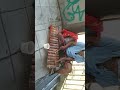 Tatay playing improvise xylophone