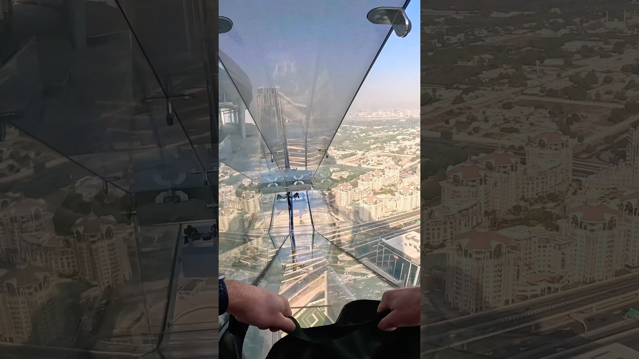 Scariest glass slide, over 200 metres off the ground! Sky Views Observatory Dubai 