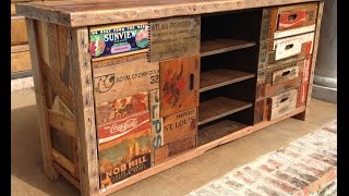 Crate Entertainment (Center). A unique piece of artistic furniture utilizing antique crates, reclaimed pallets, with lighting.