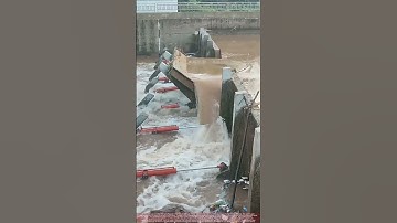 Lowering a Hydraulic Dam Gate to Release Water