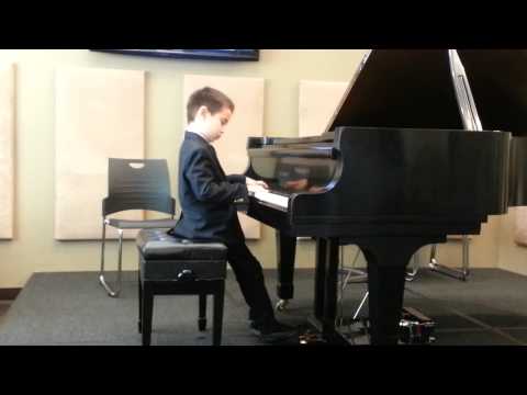 6 year old pianist performing Down by the Riverside and Fisherman's song.