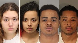 Four people have been arrested in connection with the murders of a man
and woman found shot to death their car san jacinto.