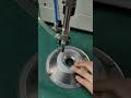 This handheld automatic nut-making machine produces one nut per second
