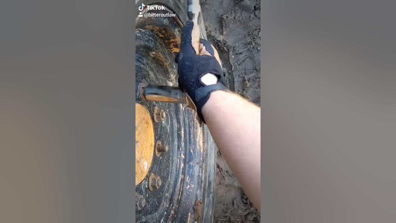 Changing a skid steer tire - YouTube