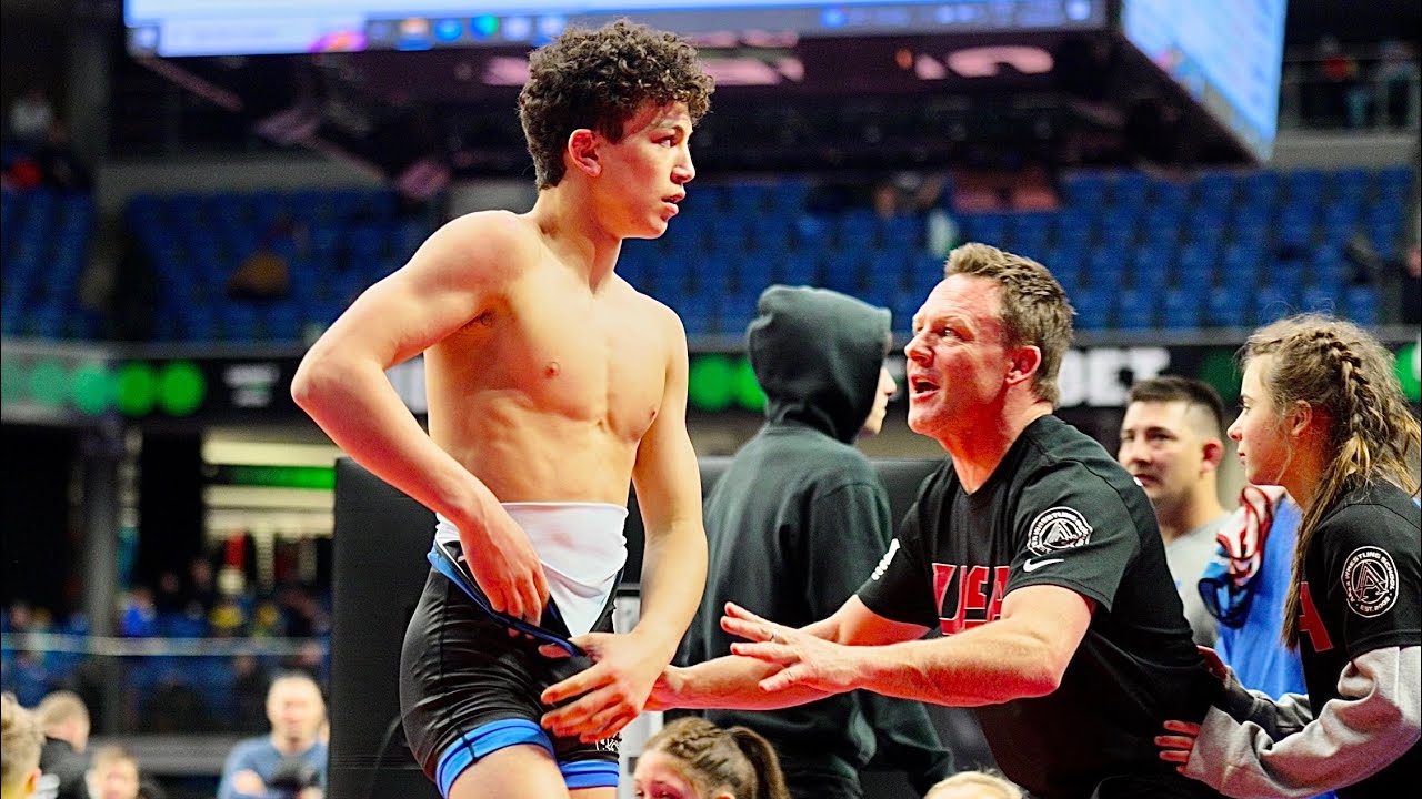 U15 M. Pliakus (LTU) vs G. Logan (USA). Freestyle 62kg youth wrestling.
