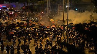 Watch live as demonstrators take to the streets in hong kong. clashes
flared outside a flag-raising ceremony marking 22 years since former
british co...