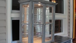 Rustic Barn Wood Curio Cabinet I made this curio cabinet out of all reclaimed materials, an old 12 panel glass door and pallets. The 