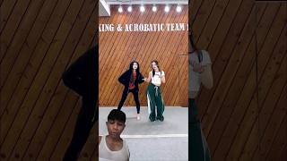 Two Girls Are Performing A Beautiful Dance