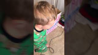 Boy accidentally runs into glass sliding door